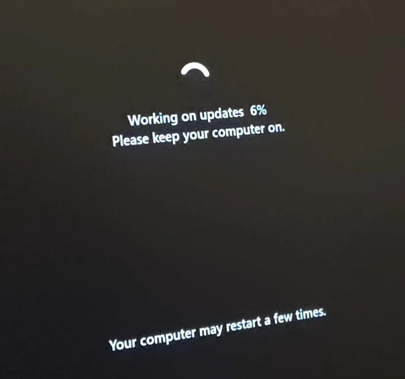 A photo of a computer display updating Windows