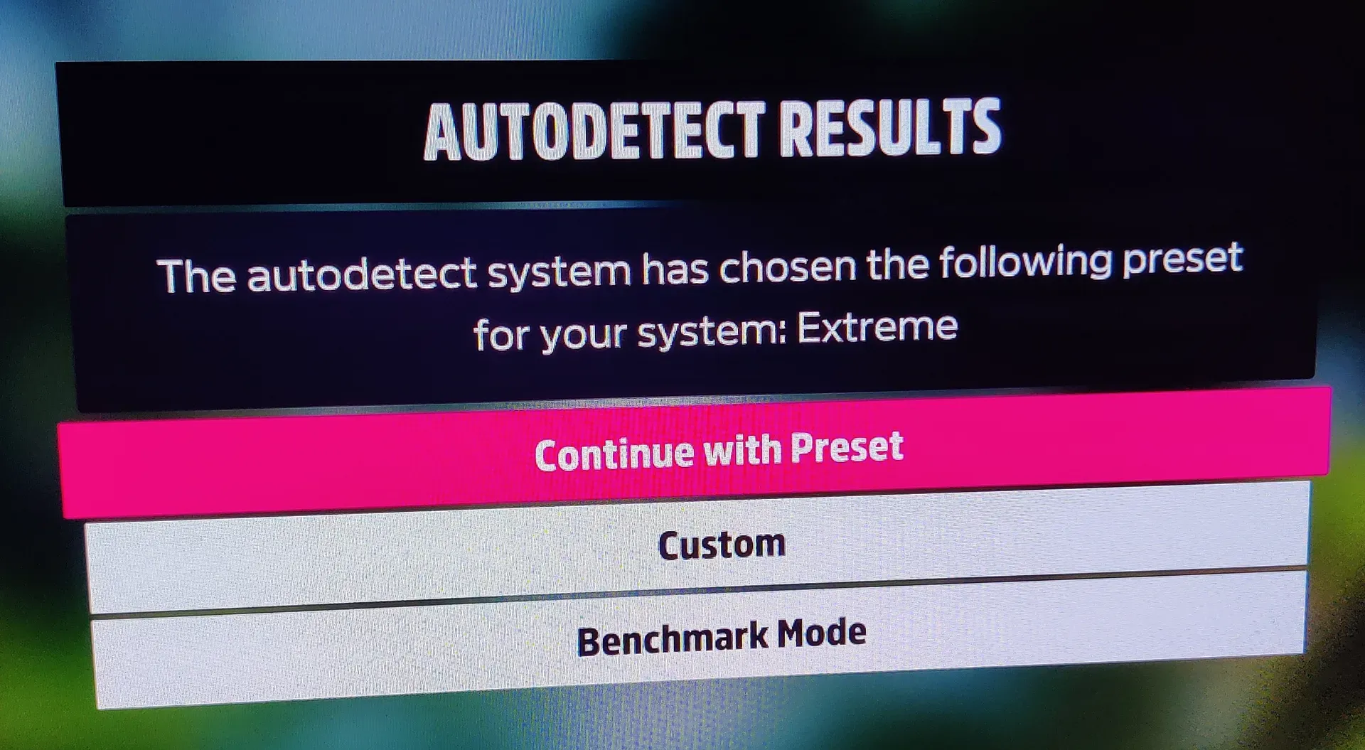 Photo of computer display with text "Autodetect results: Extreme"