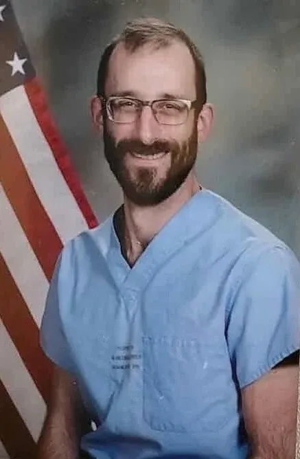 Alex Pretti in a his official portrait with the US Department of Veterans Affairs